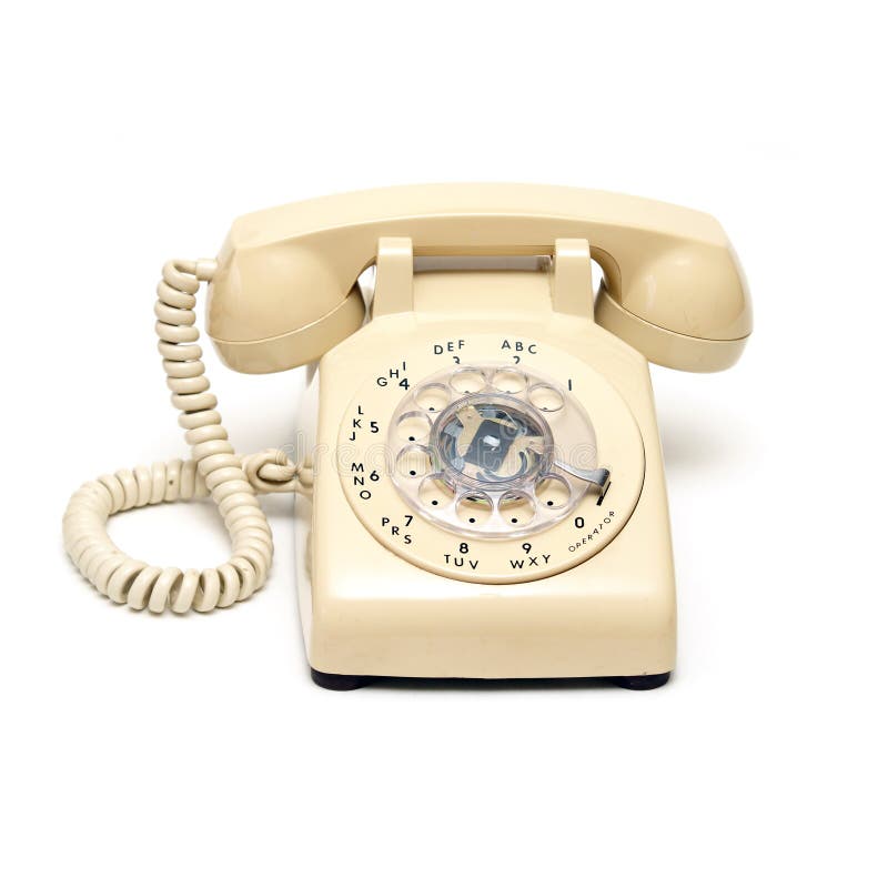 An isolated shot of a traditional rotary phone. An isolated shot of a traditional rotary phone.