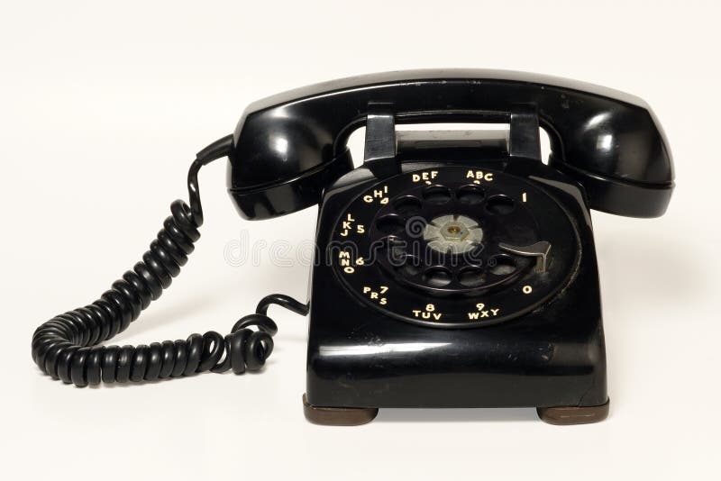 Image of an old beatup rotary telephone. Clipping path included. Image of an old beatup rotary telephone. Clipping path included.