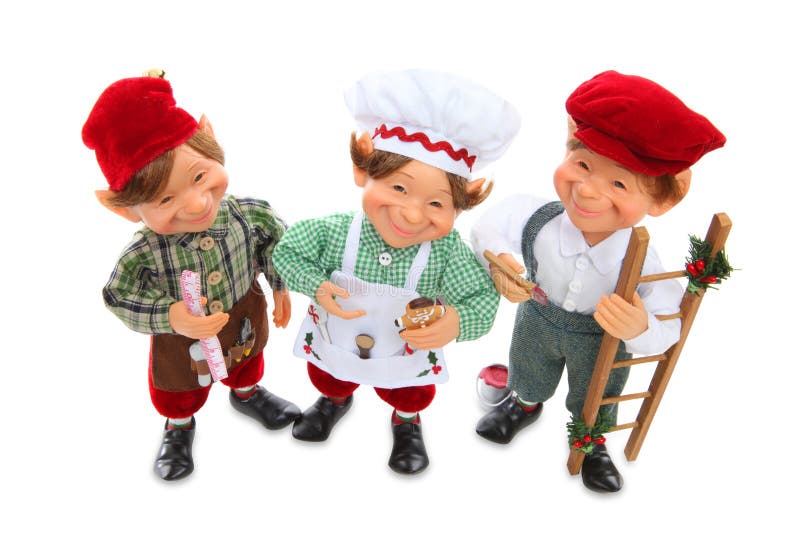 Drei Elfe Chritsmas am Lächeln stockbild Drei Elfe Chritsmas am Lächeln stockbild