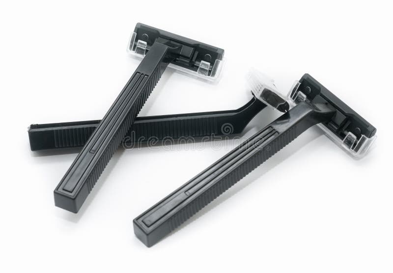 Drei neue schwarze Plastikwegwerfrasiermesser auf weißem Hintergrund stockbild Drei neue schwarze Plastikwegwerfrasiermesser auf weißem Hintergrund stockbild