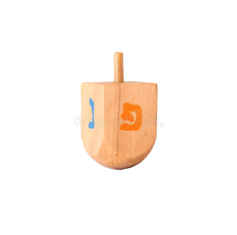 Dreidel di legno (trottola) per la festa ebrea di Chanukah immagini stock Dreidel di legno (trottola) per la festa ebrea di Chanukah immagini stock