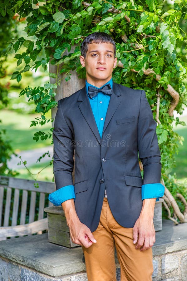 Man in Blue Shirt and Brown Pants Jumping · Free Stock Photo