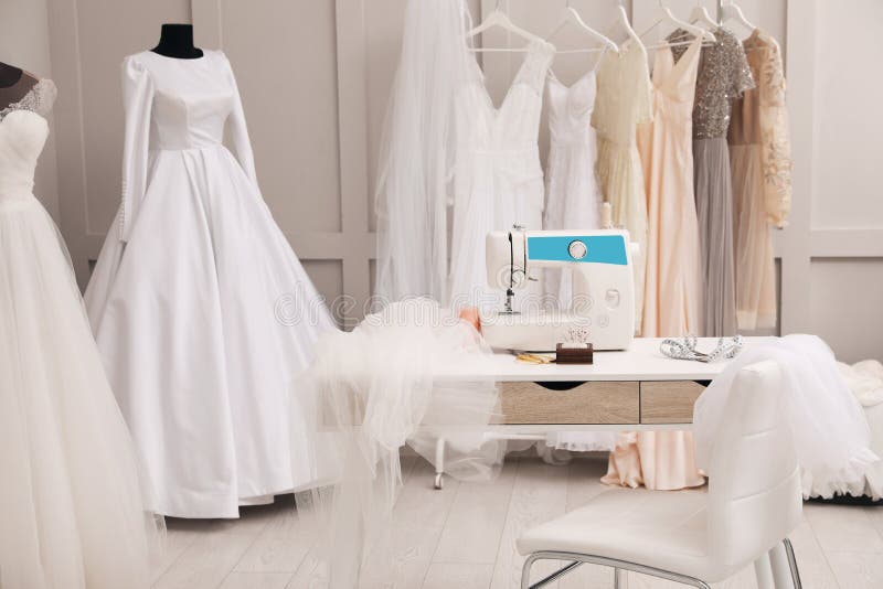 Dressmaking Workshop Interior with Wedding Dresses and Equipment Stock ...