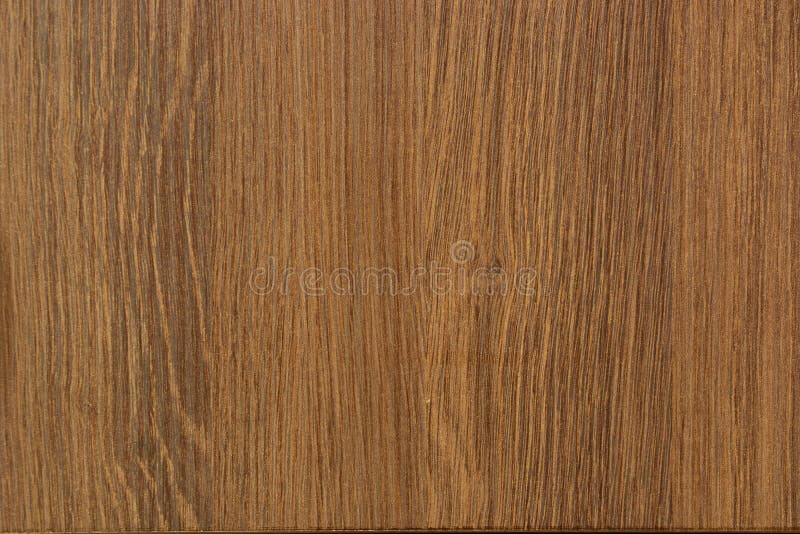 Wood grain Texture of Melamine Laminated Plywood Board. Walnut Color. Wood grain Texture of Melamine Laminated Plywood Board. Walnut Color.