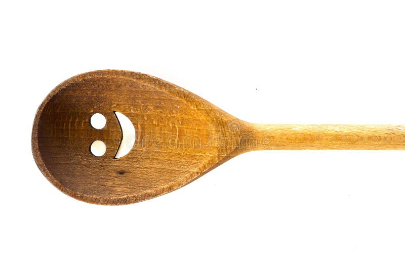 Drewniana smiley twarzy łyżka na białym tle obraz stock Drewniana smiley twarzy łyżka na białym tle obraz stock