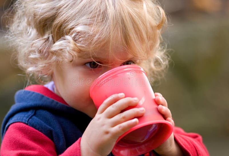 Closeup-view of a drinking child. Closeup-view of a drinking child