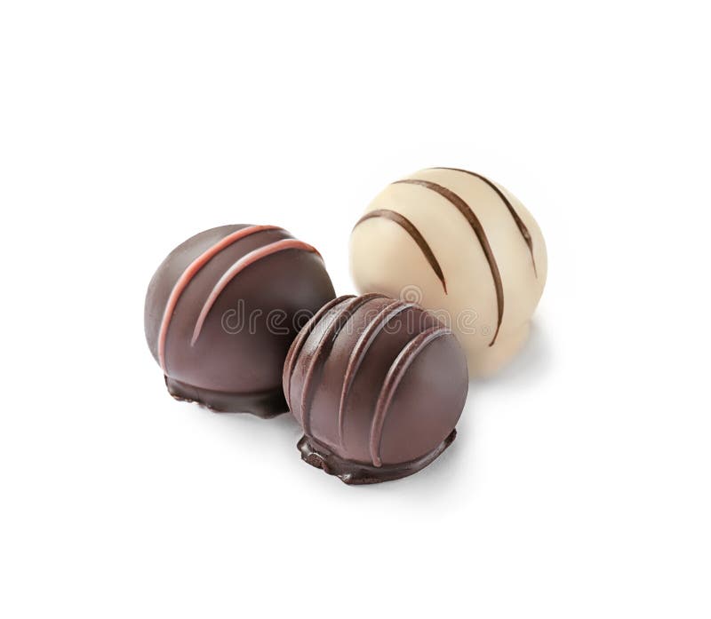 Drie heerlijk chocoladesuikergoed royalty-vrije stock foto's Drie heerlijk chocoladesuikergoed royalty-vrije stock foto's