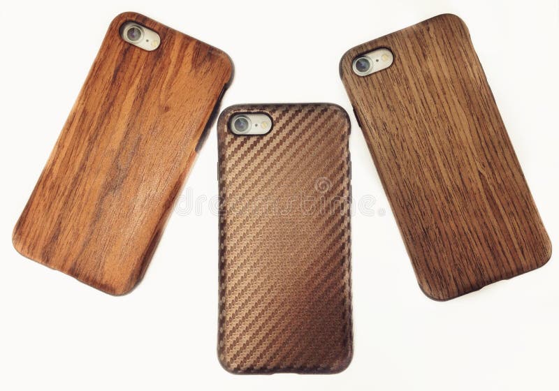 Drie houten iphonegevallen stock foto's Drie houten iphonegevallen stock foto's