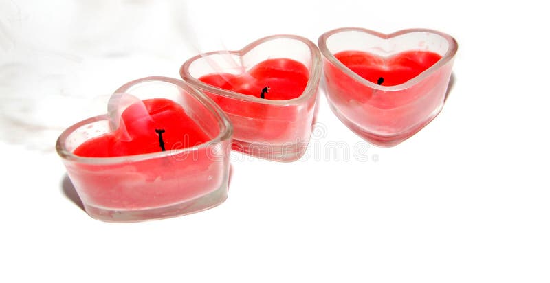 Drie rode hart gevormde kaarsen royalty-vrije stock foto's