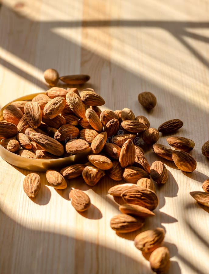Dried almonds nut in lazy time: vintage tone. stock photo