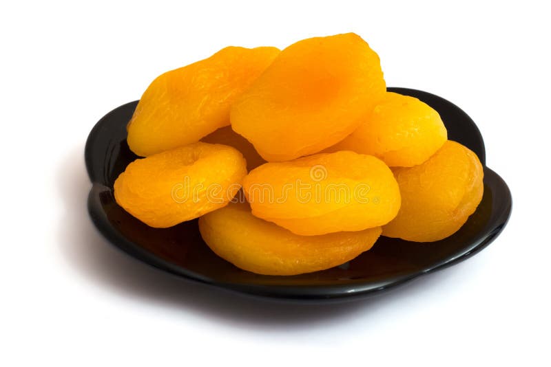 Dried Apricots on a White Isolated Background. Dry Apricot Fruit_ Stock