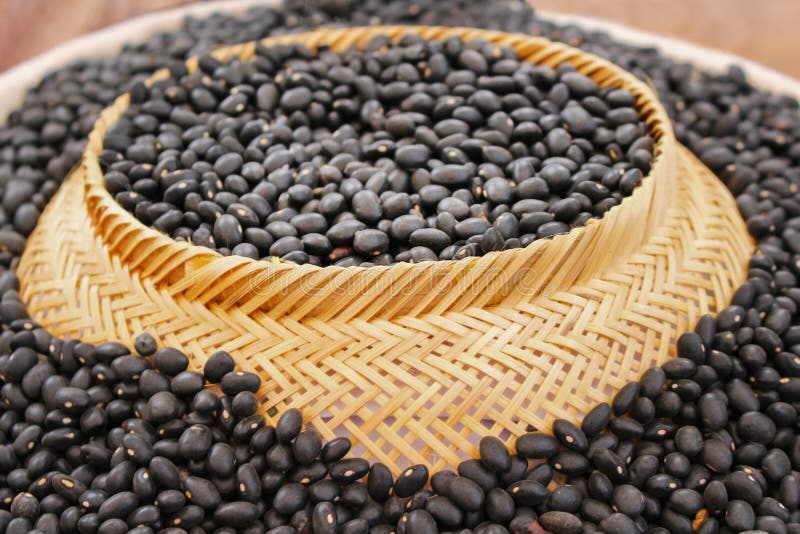 Dried black bush bean seeds or cowpea, southern pea texture in basket for background ,huge group