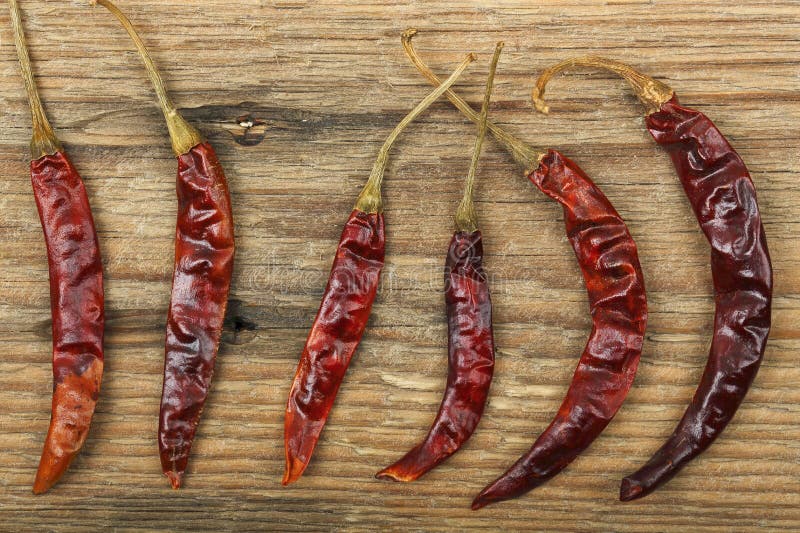 Dried chili peppers stock photo. Image of cooking, wood 38428668