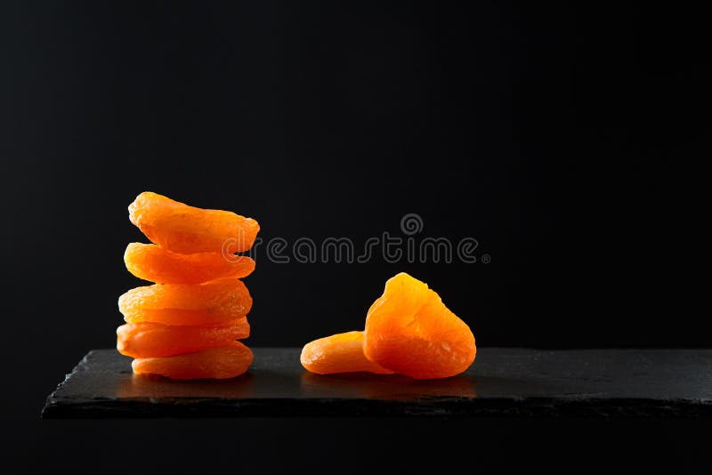 Dried Fruit or Dried Apricot on Black Background. Studio Image Stock