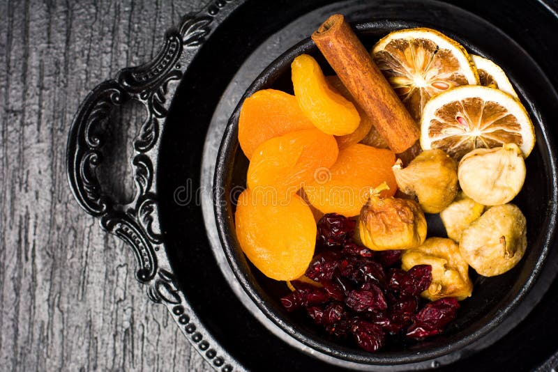 Dried Fruit Slices on a Dark Plate Stock Image Image of delicious