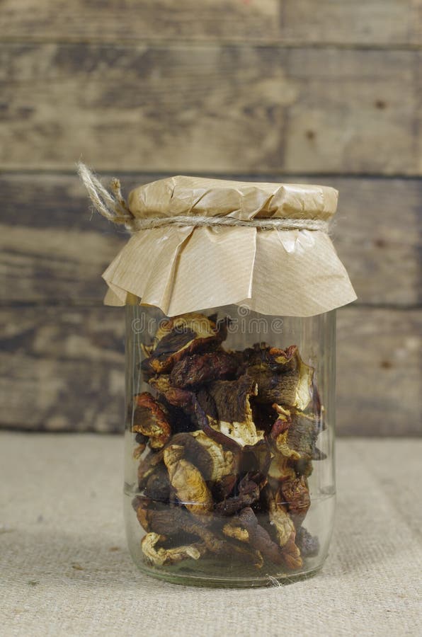 Dried mushrooms in jar stock image. Image of healthy 35672613