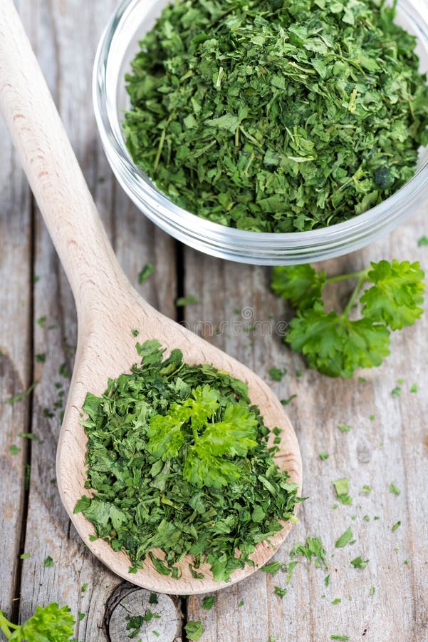 Dried Parsley on a Wooden Spoon Stock Photo Image of herb, ingredient