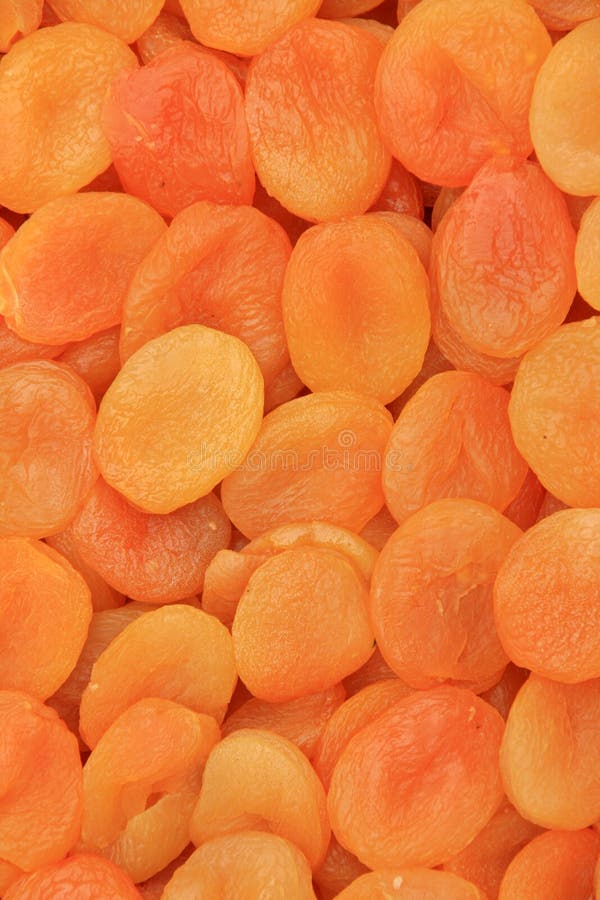 Background of orange dried peaches. Background of orange dried peaches