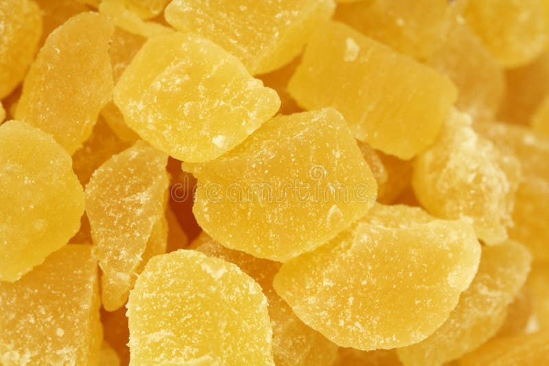 Dried pineapple slices background stock photo