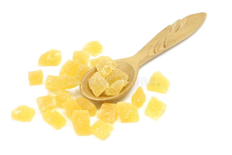 Dried pineapple slices in a wooden loshka stock photos