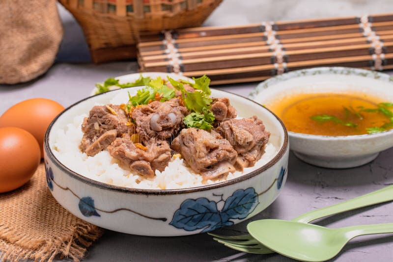 Dried Rice Porridge with Boiled Pork Bones and Broth Stock Image