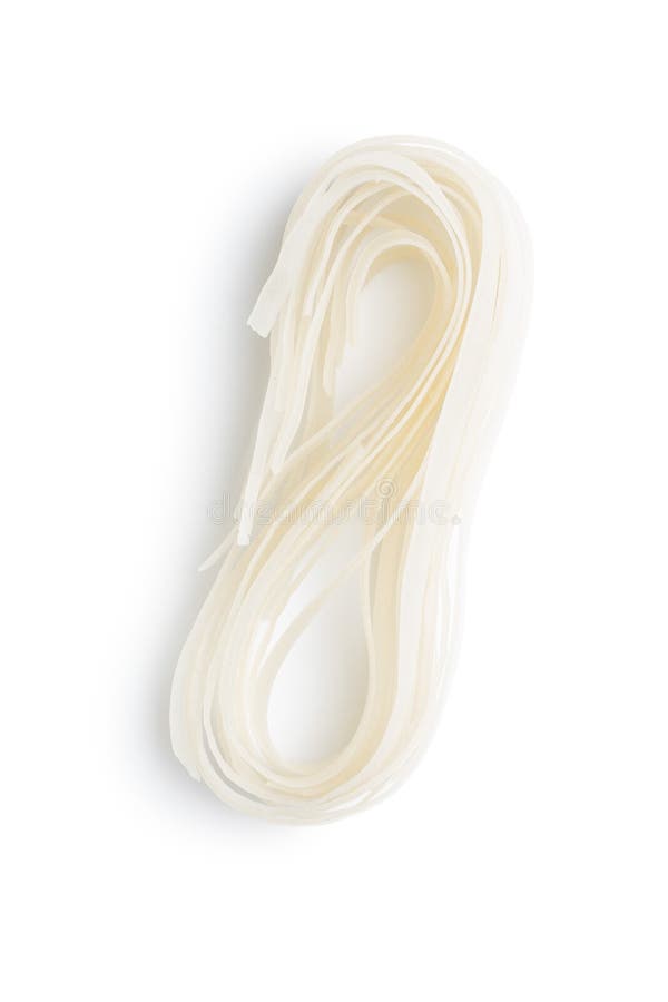 Dried white rice noodles. Raw pasta. Uncooked noodles royalty free stock image