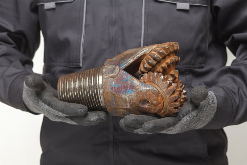 Drill bit in hands stock photo. Image of carbide, gasoline 69927690