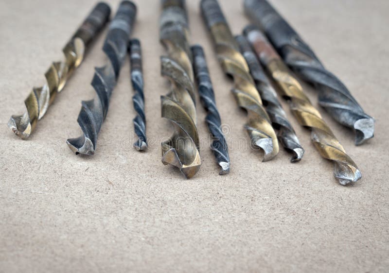 Different Types of Drill Bits. Old and Wornout Drill Bits in Various