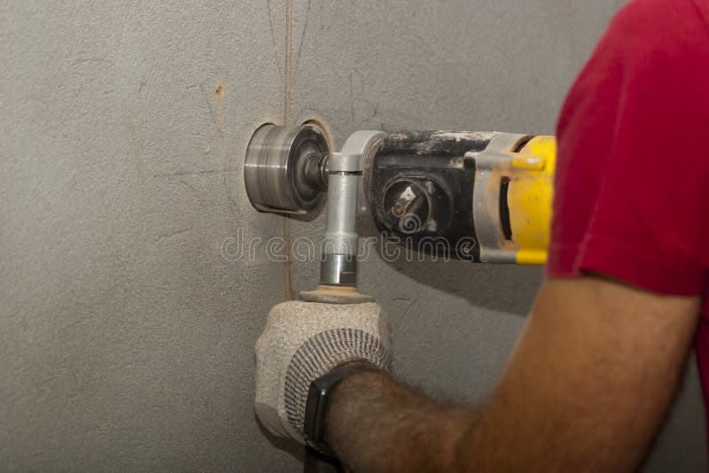 Drilling Holes in the Wall for an Electrical Outlet Box or Switch Stock