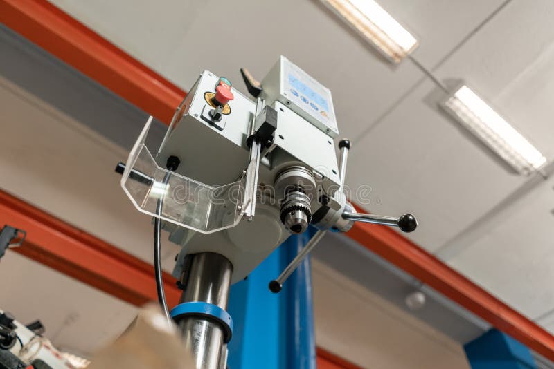 Drilling Machine. New Industrial Iron Drill in Interior. Tool