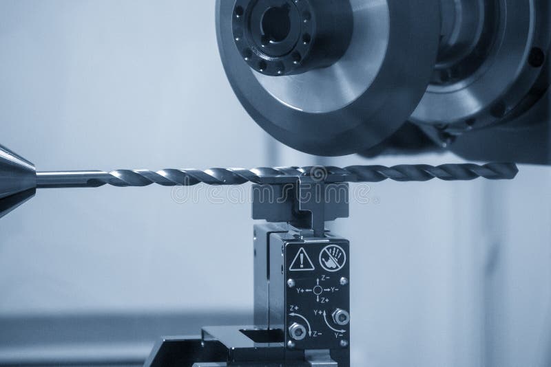 The Drilling Tool Regrinding Process with Abrasive Wheel Stock Photo