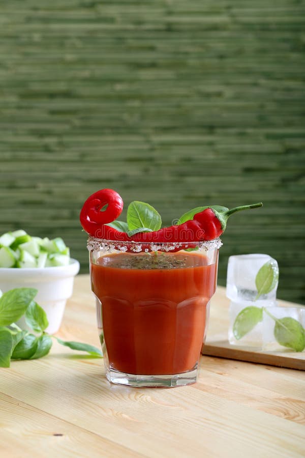 Drink or Cocktail with Tomato Juice and Red Hot Chilli Stock Photo