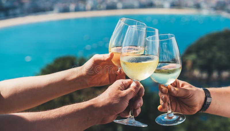 Drink three glasses white wine in friends hands outdoor seascape holidays, romantic couple toast with alcohol, happy people cheer