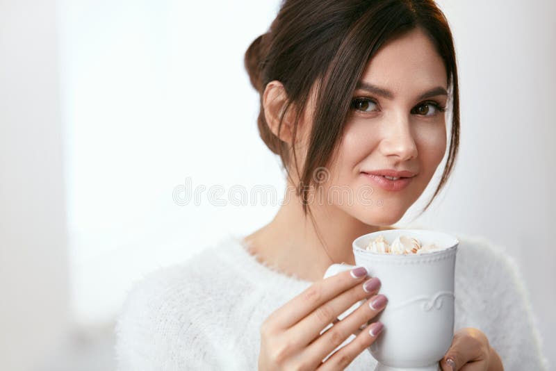 Drink. Woman Drinking Hot Drink