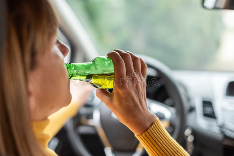 Drinking Alcohol while Driving Stock Photo Image of people, interior
