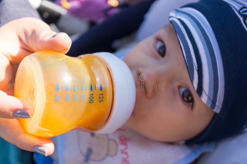 Drinking baby stock photo. Image of bottle, drinking 45271828