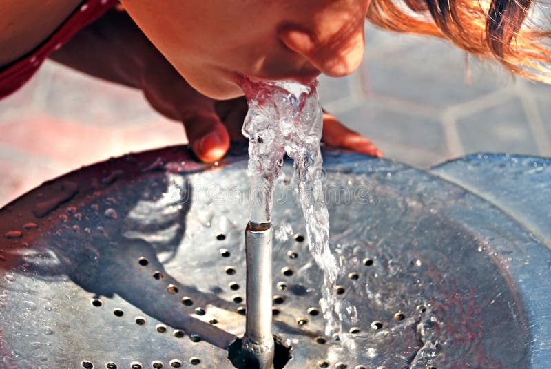 Drinking from water fountain