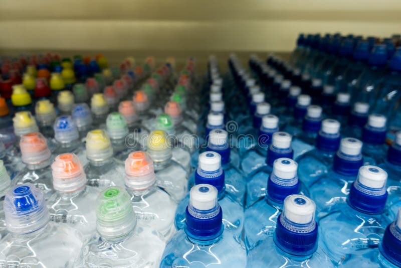 Drinking Water, Multicolored Plastic Cap. Bottle Caps on the Market