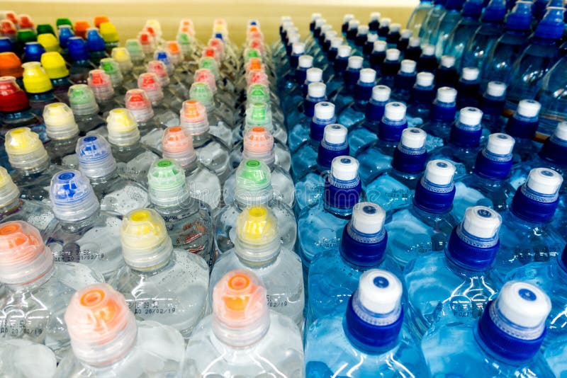 Drinking Water, Multicolored Plastic Cap. Bottle Caps on the Market