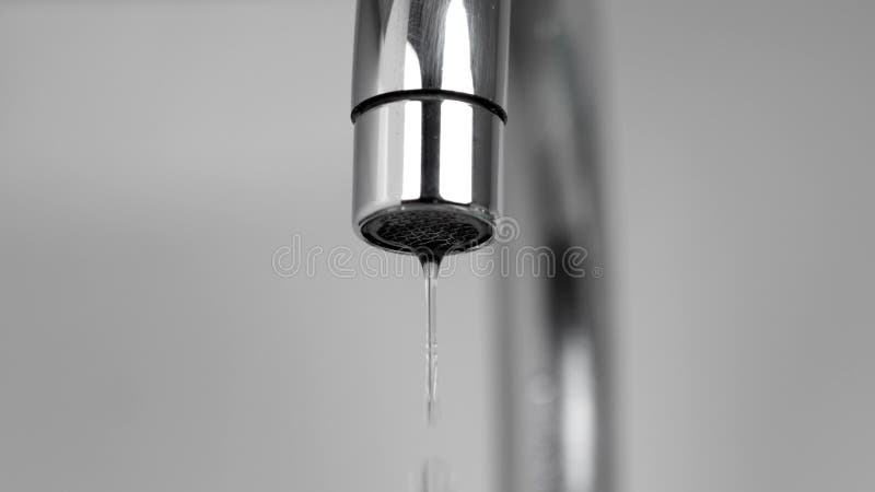 Dripping water faucet or kitchen tap.