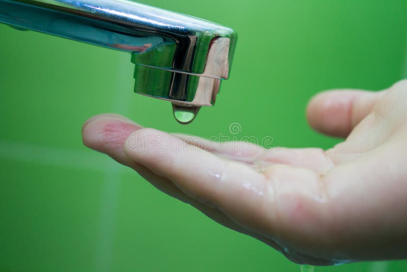 Dripping water on hand stock photo. Image of clean, hand 49178076
