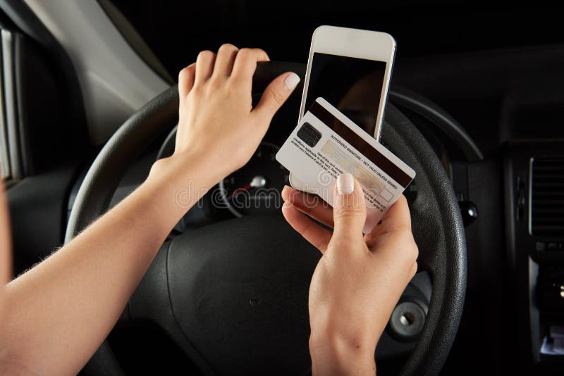 Driver with credit card stock photo. Image of buying 76103010