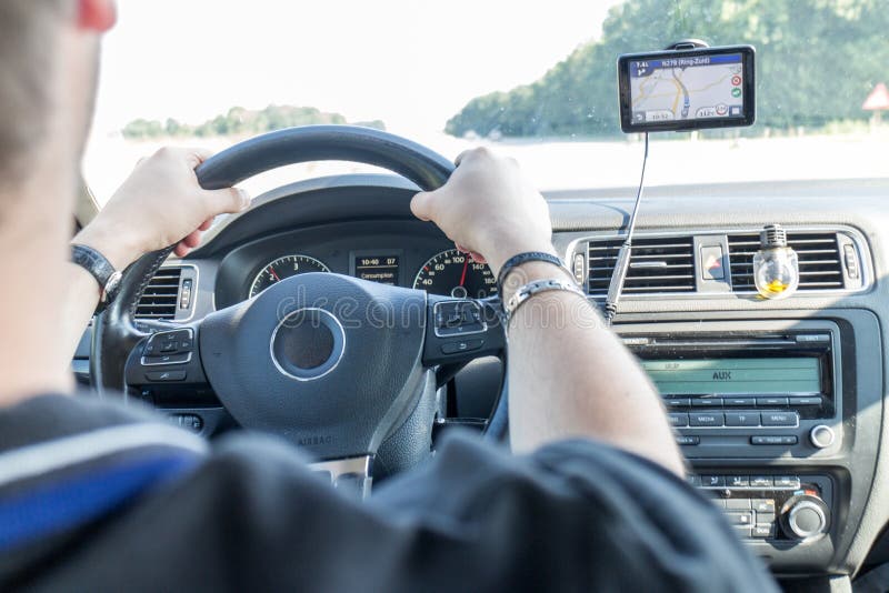 Driver driving car with navigation system royalty free stock image Driver driving car with navigation system royalty free stock image