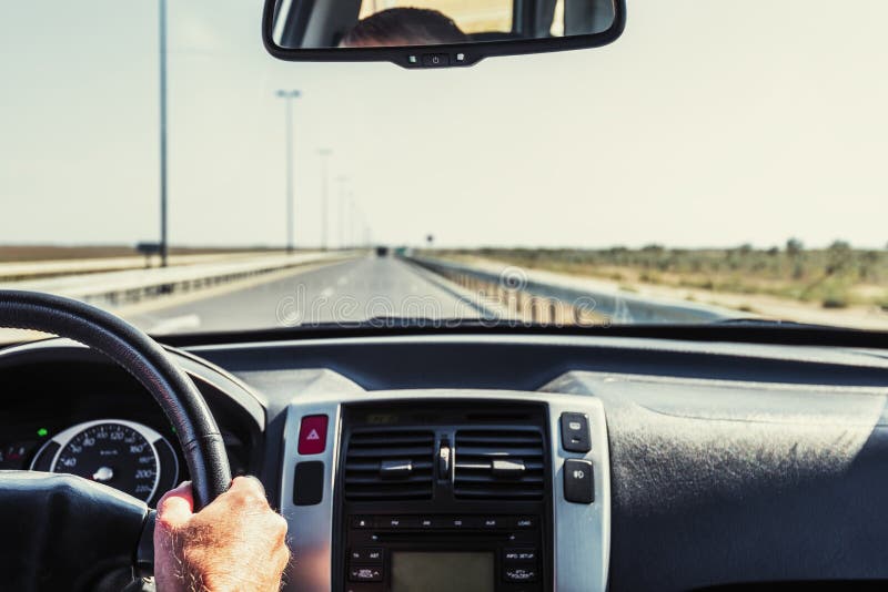 Driver Hand on the Steering Wheel of a Car Stock Photo Image of
