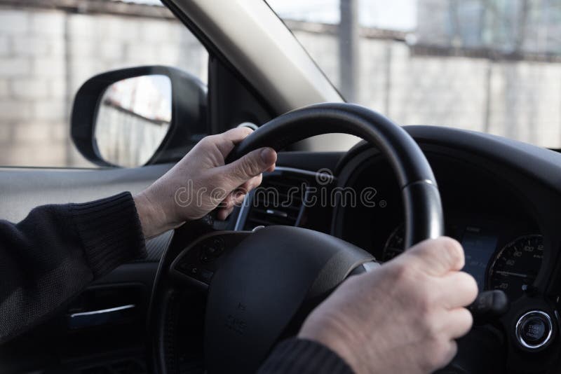 The Driver`s Hands are on the Steering Wheel Stock Image Image of