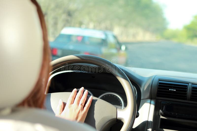 Driver Use Horn To Warn Car in Front of Her Stock Image Image of road