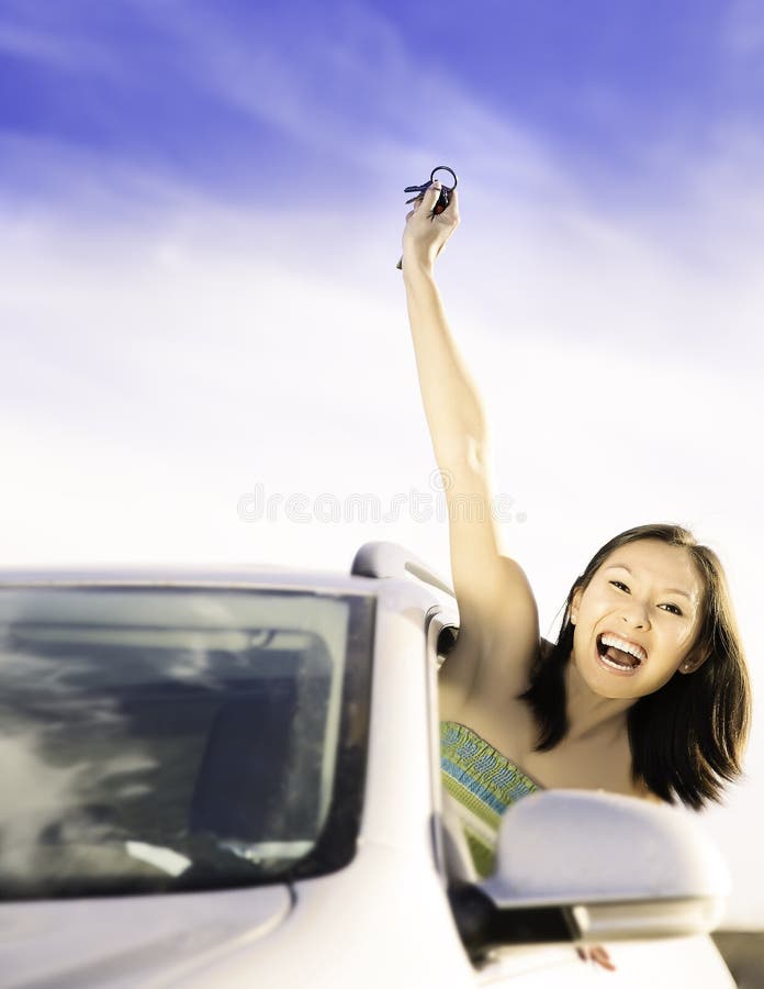 Driver woman showing new car keys royalty free stock images Driver woman showing new car keys royalty free stock images