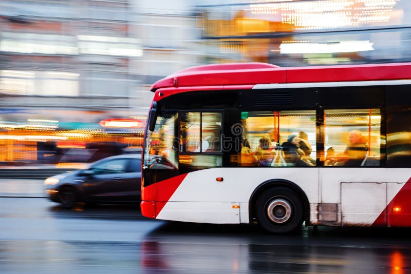 Driving bus in the city at night royalty free stock photo Driving bus in the city at night royalty free stock photo