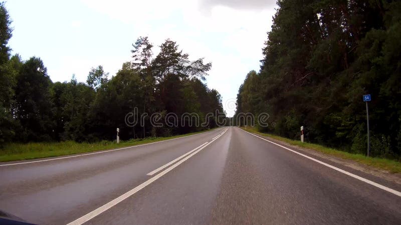 Driving a Car on a Country Road - POV - Point of view front - windshield. stock video footage