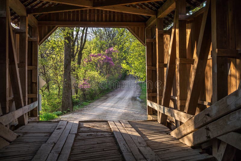 Driving through a covered bridge. A spring time road trip is made even better, as we drive through a old covered bridge in southern Indiana USA